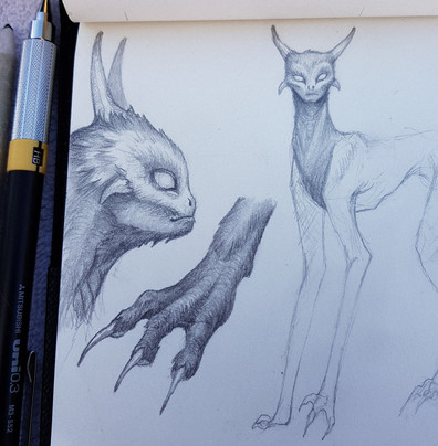 scribbles of a quadruped creature with horns