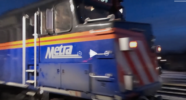 Screen grab from a hacked together video showing a passing Metra train