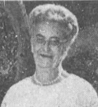 Alathena Johnson Smith, from a 1972 newspaper story; an older white woman smiling outdoors, wearing glasses, a white top, and a strand of beads or pearls