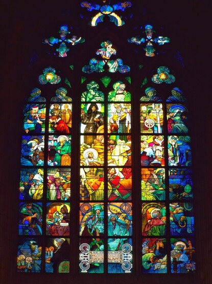St. Vitus' Cathedral stained glass by Alphonse Mucha.  At the bottom is text that describes it as a tribute to the slavic nations
