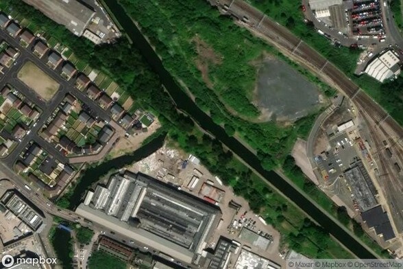 A satellite image of the area containing Basin Bridge-Tunnel, Cape Arm. Provided by MapBox.