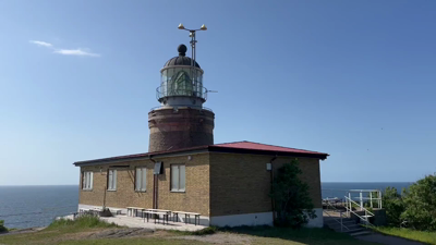 A closeup of the lighthouse. A rotating lens could be seen in the glass enclosure