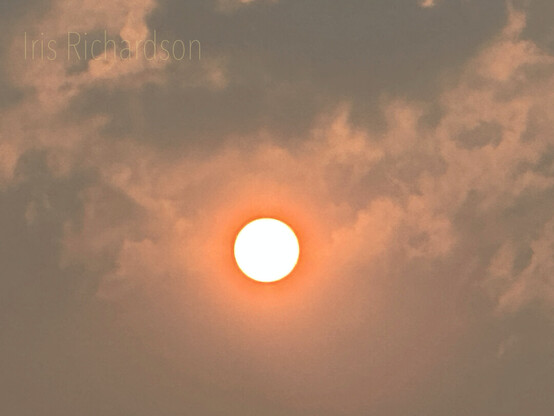 June 8 , 2023 hazy sky with orange sun and clouds. The fires from Canada are creating dangerous air conditions even here in South Jersey.