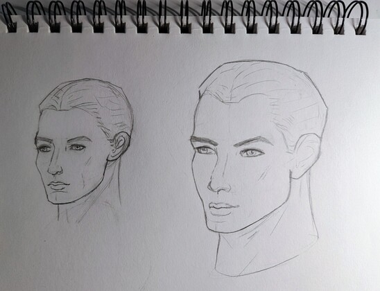 Two male head sketches.