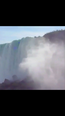 The video, filmed by a tourist at the famous falls along the U.S.-Canada border, initially shows only the thundering cascades. Moments later, a small white orb is seen slowly descending from the mist above the falls. The spherical object then rapidly plunges into the rapids before shooting back out of the water at high speed and vanishing into the sky.