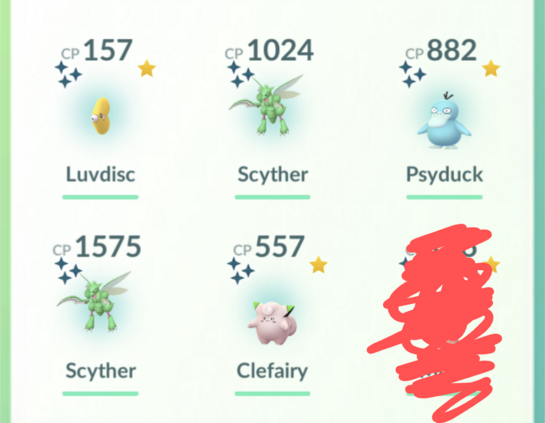 A Pokémon Go storage box showing 5 shinies - Luvdisc (gold), 2x Scyther (lighter green with pink accents), Psyduck (ice blue) and a Clefairy (still pink).