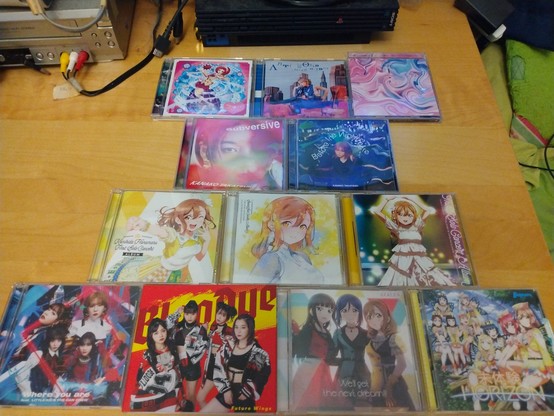 All of Kin-chan's CDs laid out on a desk.