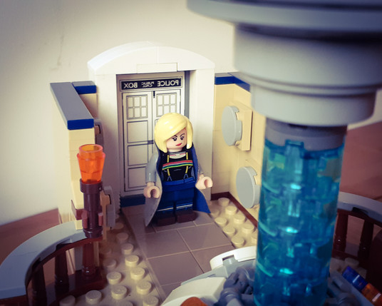 The 13th Doctor entering the TARDIS.