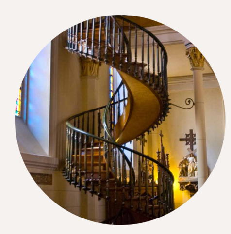beautiful winding wood staircase, the mystery stairs of Loretto Chapel built in 1850