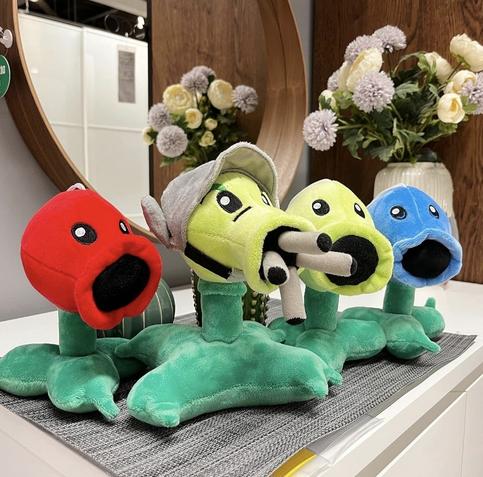 Four plant plush toys.