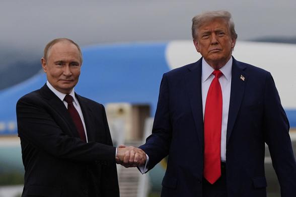 President Donald Trump greets Russia's President Vladimir Putin Friday, Aug. 15, 2025, at Joint Base Elmendorf-Richardson, Alaska. AP Photo/Julia Demaree Nikhinson
