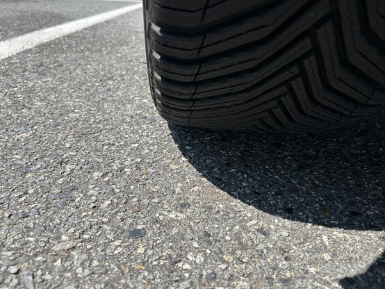 Back view of directional tires with a v patterned tread.