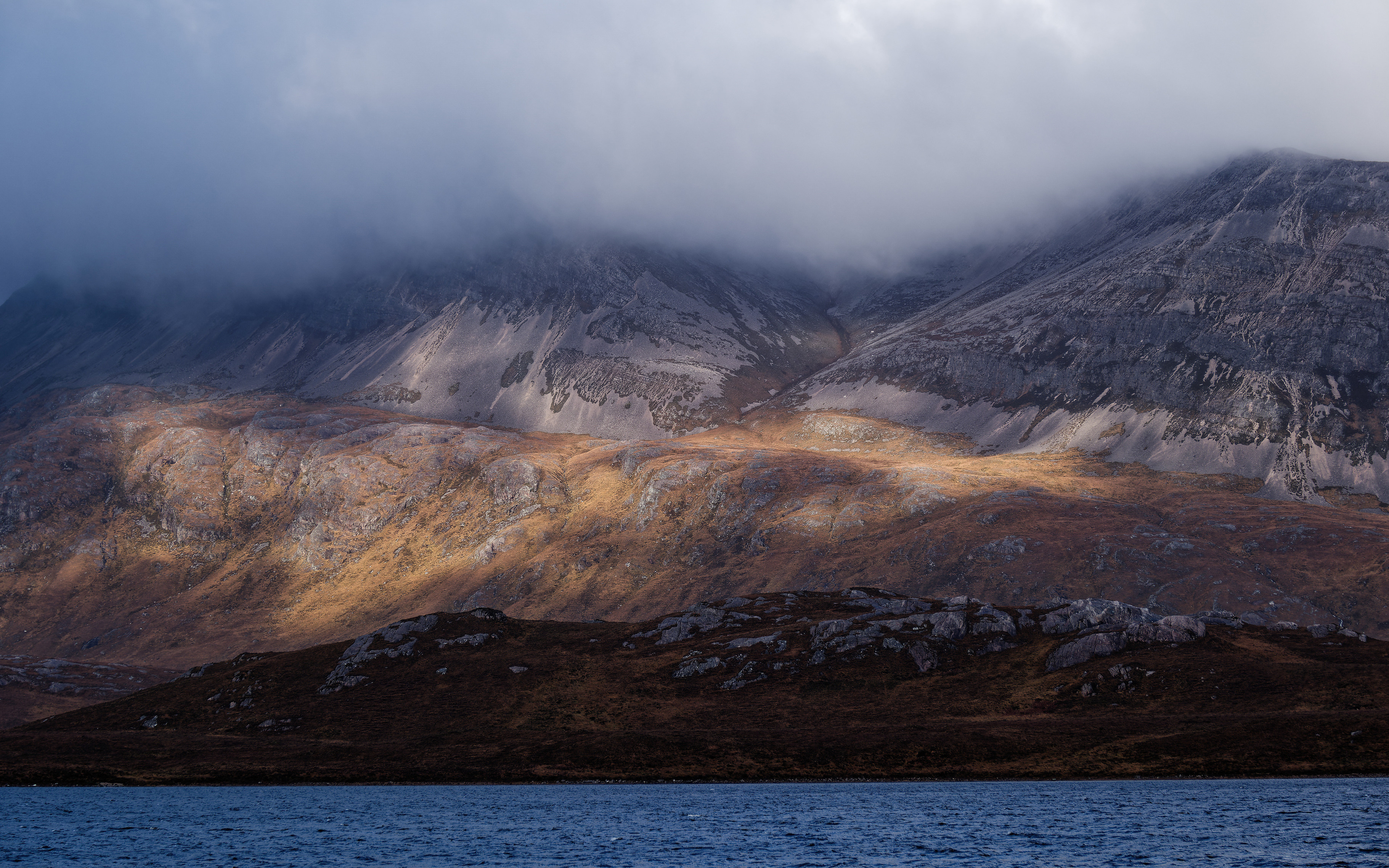 Dramatic atmosphere: sunlight on Ben Stack