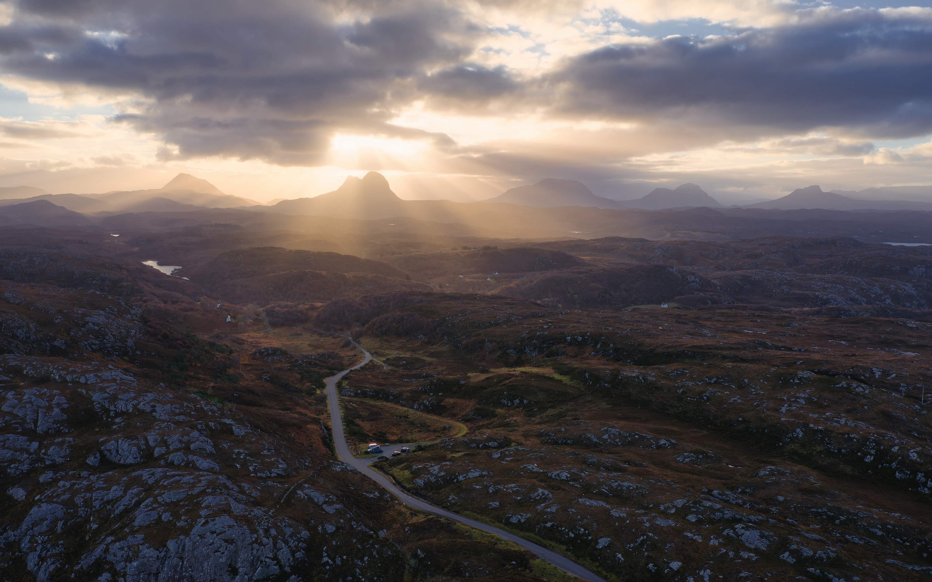 Sunrise behind Suilven taken by drone, with my favoured old road (a former drove route) in the foreground