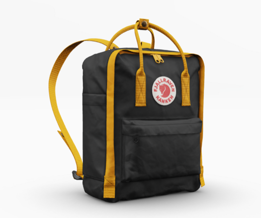 A black Fjallraven Kanken backpack with yellow accents