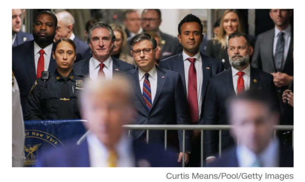 A news photo of identically dressed Republican officials standing behind the disgraced former president outside the court room.