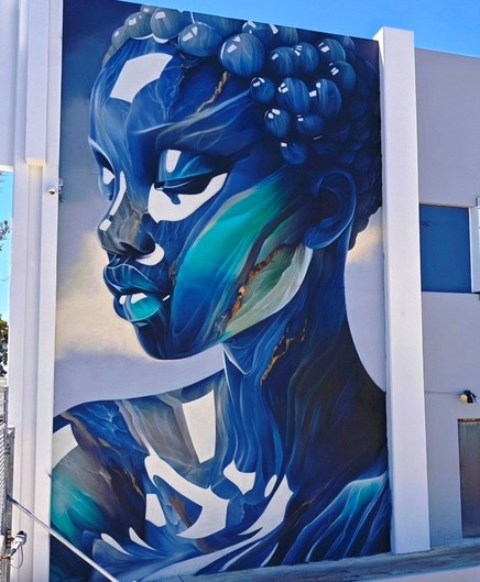 Streetartwall. A great mural of a woman in 
