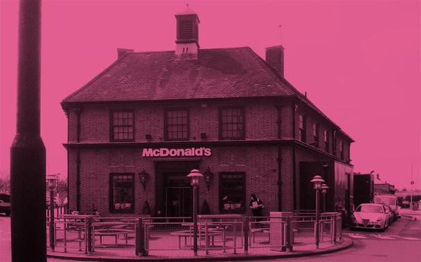 A McDonald's restaurant in a former pub building on a road junction in South London.