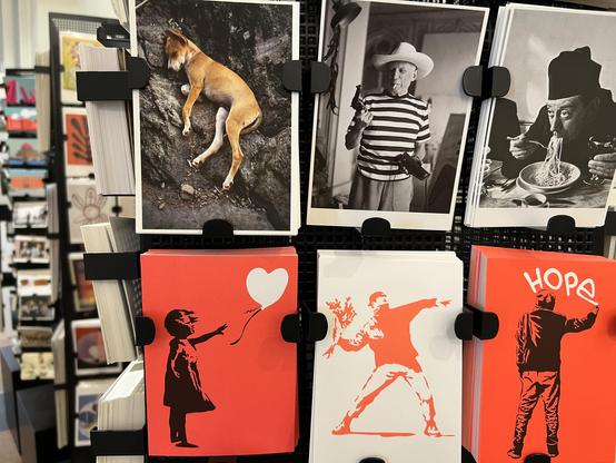 Photo of six postcards: picasso, banksy and funny sleeping dog