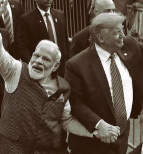 Trump and rightwing Indian leader Modi holding hands at a rally.

They’re the same kind of politician