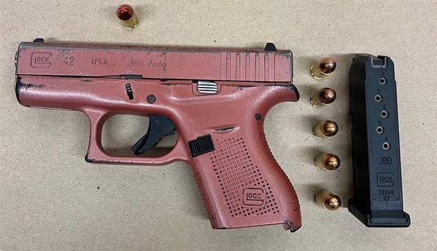 Pink gun, bullets and magazine police say they found at the scene