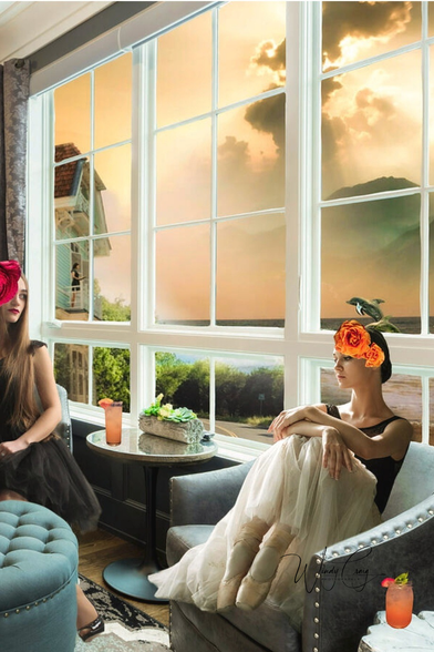 Two women dressed in elegant attire sit in a luxurious room adorned with large windows overlooking a picturesque sunset. Each woman wears a floral headpiece, and two drinks are on the tables next to them.