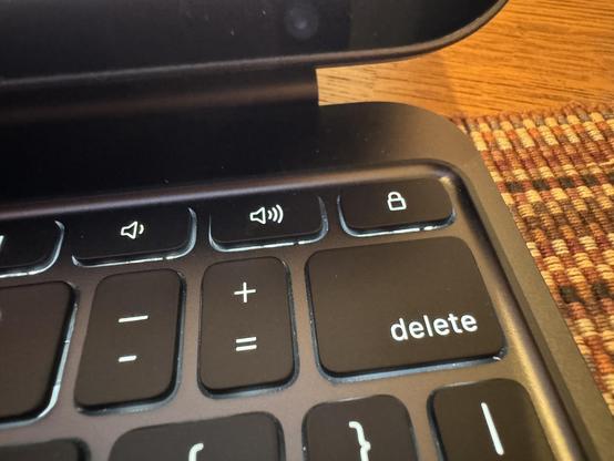 An iPad Magic Keyboard. A lock key, which locks and shuts off the iPad screen, is right above the delete key, and so therefore extremely easy to accidentally hit.