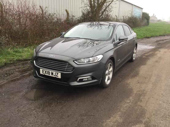 Grey metallic fourth-generation Ford Mondeo, front quarter view