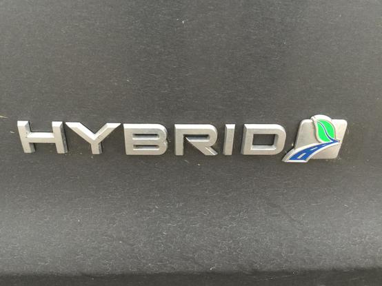 Grey metallic fourth-generation Ford Mondeo, ‘HYBRID’ tailgate badge