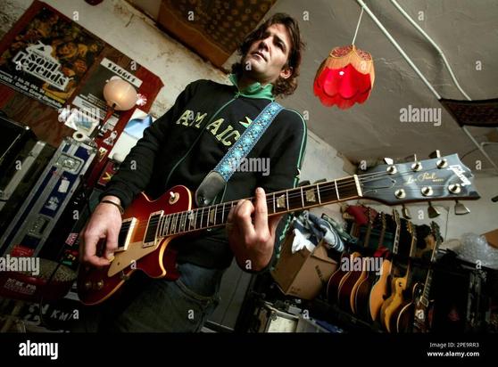 Tuesday musician kevin martin plays his guitar tuesday march 22 2005 at his music studio in the garage of his hollywood home in los angeles martin vocalist for the 1990s band candlebox credits a file sharing song promotion involving the yoo hoo drink brand with generating online interest and some sales for his new la based band kevin martin and the hiawatts ap photodamian dovarganes 2PE9RR3