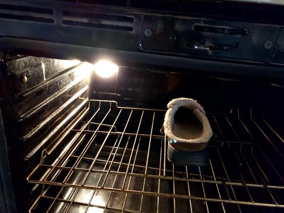 A house clog left out in Monday afternoon’s thunderstorm drys in the oven. It’s on the middle rack roasting at 40 C or so. DW elected to roast it directly on the rack. 