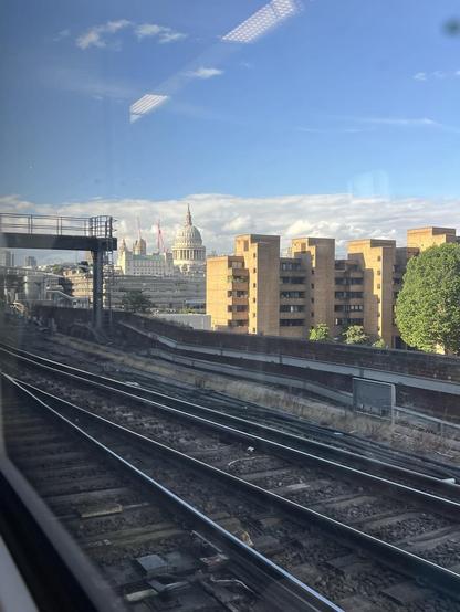 View from Thames link station towards the city. Train lines in foreground