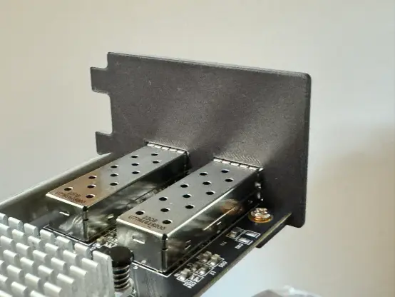 A 3D printed bracket mounted on a PCIe network card