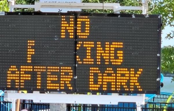 Signboard that used to tell drivers they couldn't park there after dark, but which now reads as if they can't engage in sex there after dark