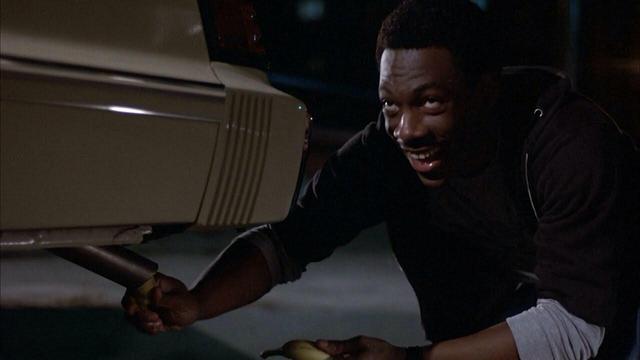 Eddie Murphy putting a banana in the tailpipe from 