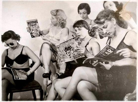 Girls reading comics in their underwear. Early 1950s.