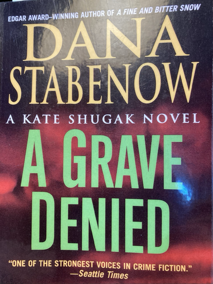 The cover of A Grave Denied by Dana Stabenow 