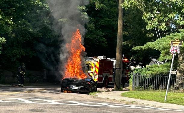 Black Lamborghini fully engulfed in flames on Neponset Valley Parkway, photo by Matt Shuman