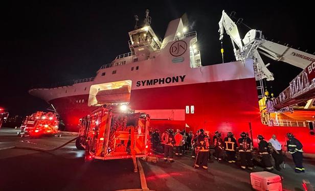 Firefighters get ready to board the Symphony in Charlestown, photo by BFD