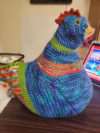 A chicken is born... Multicolored and blue knitted chicken