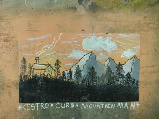 Close-up photograph of the primarily orange piece.  It depicts a house or other building on a low hill, smoke rising from its chimney.  In the background are a forest, and beyond that, three white-and-gray mountains.  The orange sky is filled with white clouds as well as lines that give the impression of wind.  Below it are three signatures in ordinary lettering: 