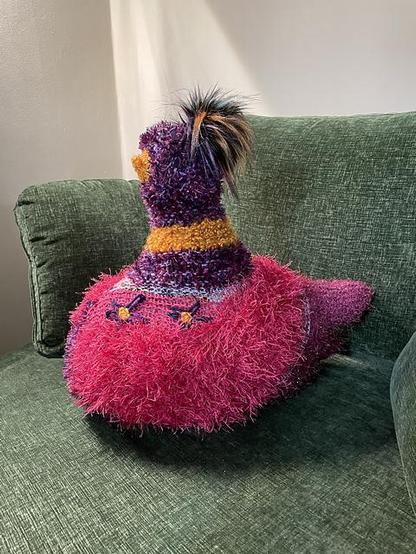 Emotional support chicken dressed in finery