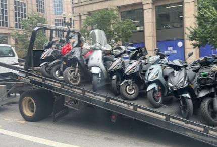 Seized scooters on Boylston Street in the Back Bay, photo by BPD