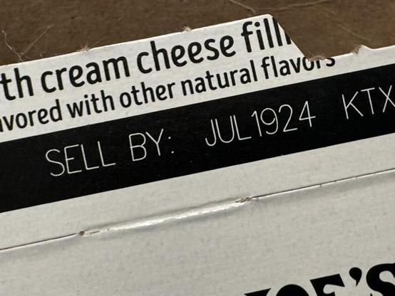 A box end for something with cream cheese filling. The expiration date is July 1924. Or so it seems, thanks to bad text spacing!