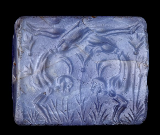 🤸 Seal depicting tumblers or acrobats in a field of lilies, c. 1700–1450 BCE. Chalcedony stone, 2.1 cm x 1.8 cm. AN1938.955