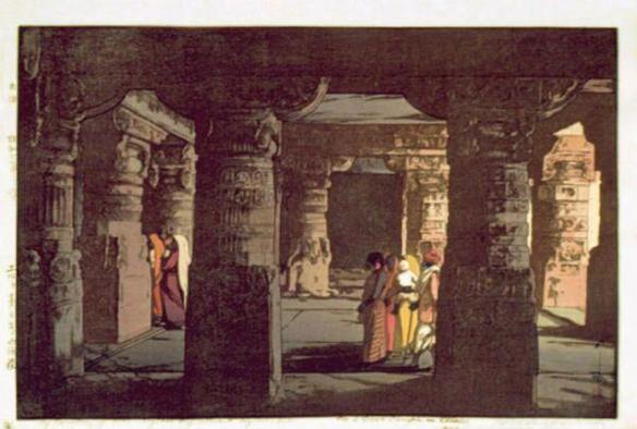 Print of cave - stone carved temple, pillars in foreground and a few people in sarees and Indian garb in a room of the temple