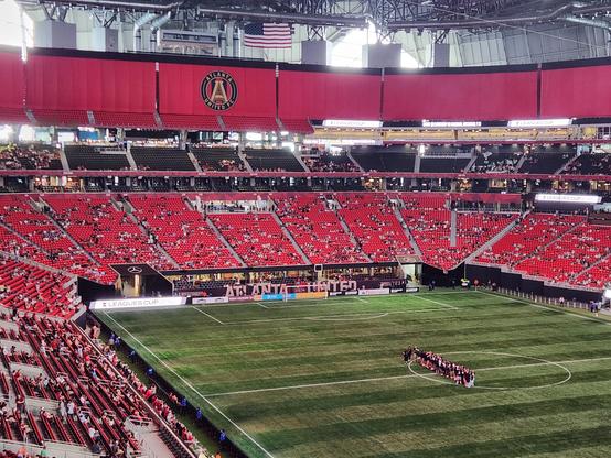 Atlanta united stadium just before gametime, with several sections completely empty