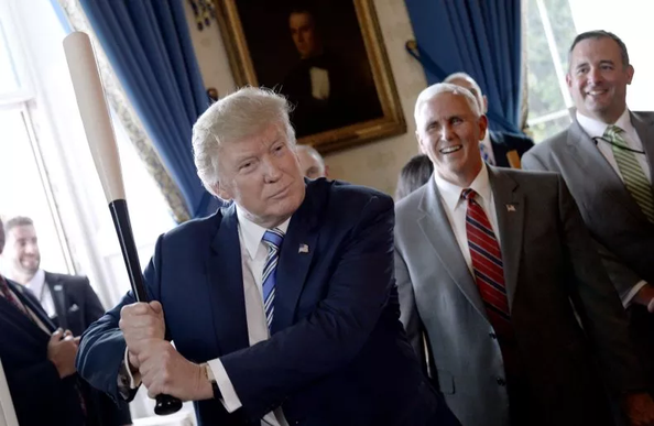 Trump swinging a bat President Donald Trump swings a Marucci baseball bat