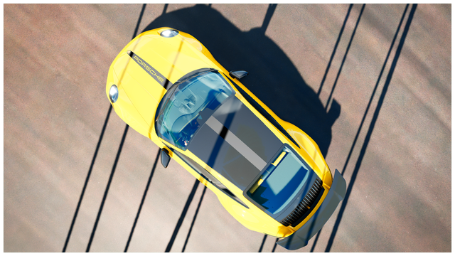 A yellow 911 Porsche seen from above, with electricity cables crossing through the image.