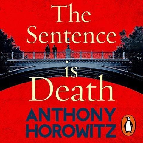 Image for the book cover for The Sentence is Death by Anthony Horowitz. The image has a red background with a old, ornate bridge across the middle with a single light in the middle. There are two male figures on the bridge and either end is tree / bush covered. 